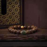 Bracelet de force émaillé en bois d'agar de KarmaRipple