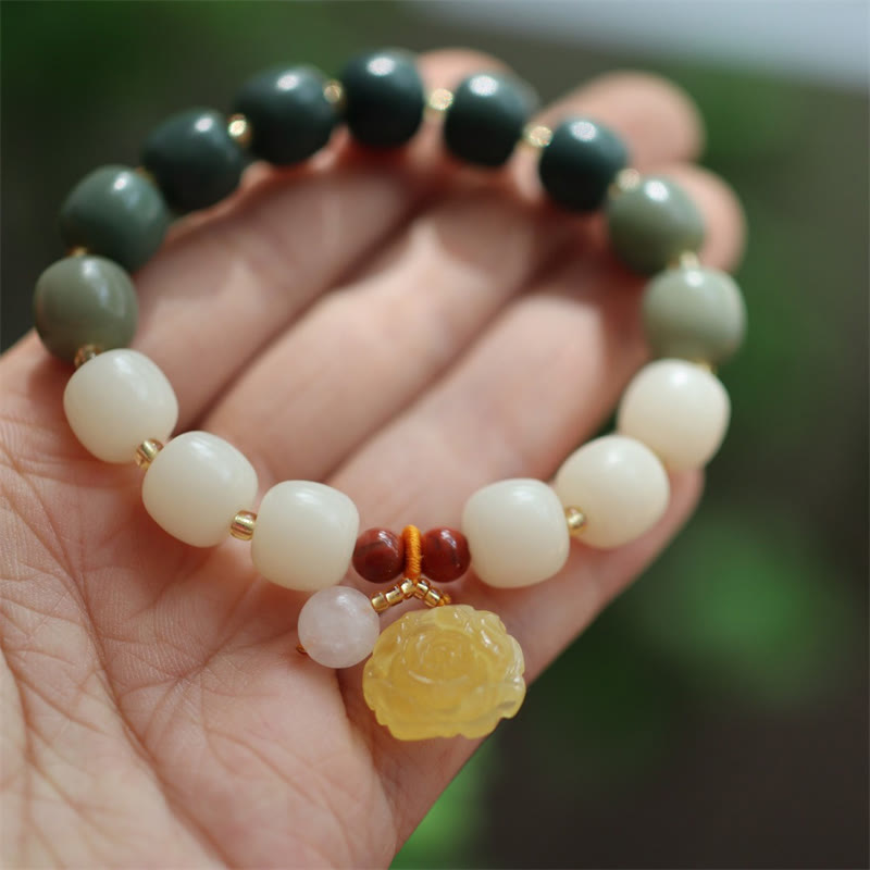 KarmaRipple's Gradient Bodhi Seed Amber Lotus Peace Bracelet p1