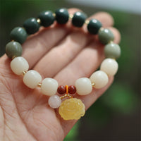 Bracelet de paix en ambre et graines de Bodhi dégradées de KarmaRipple