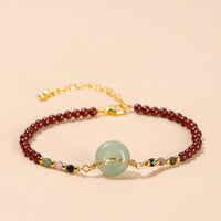 Bracelet de perles de paix en grenat authentique de KarmaRipple