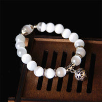 Bracelet porte-bonheur tibétain œil de chat de KarmaRipple
