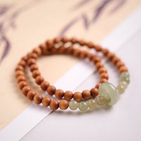 Bracelet double tour de protection en jade Hetian et bois de santal de KarmaRipple 