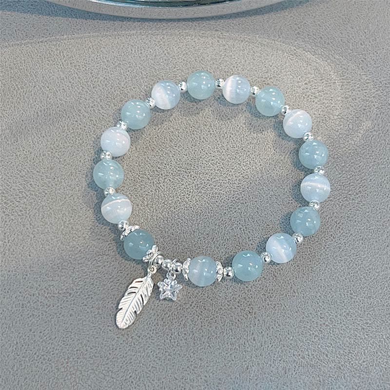 KarmaRipple's 925 Sterling Silver Aquamarine Cat's Eye Balancing Feather Star Talisman Bracelet p1