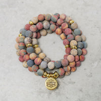 Bracelet énergétique courageux en jaspe Picasso, 108 perles Mala de KarmaRipple