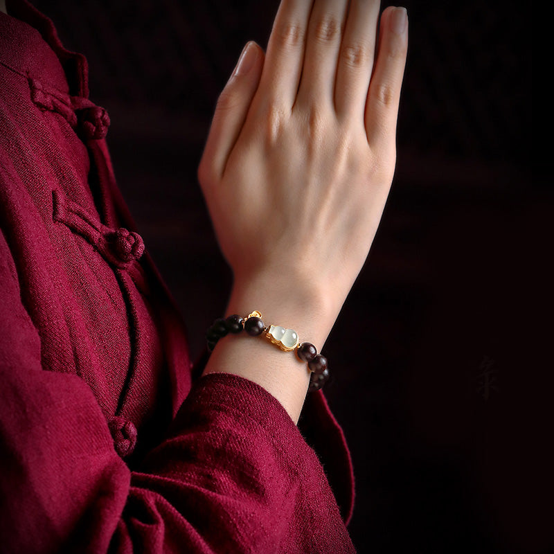 KarmaRipple's Small Leaf Red Sandalwood Gourd Jade Calm Relaxation Bracelet p6