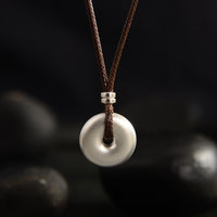 Collier avec pendentif rond en argent sterling 999 et boucle de paix de KarmaRipple