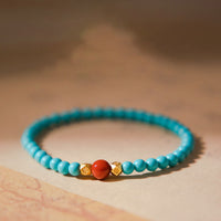 Bracelet de protection en perles d'agate rouge turquoise de KarmaRipple