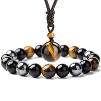 Ensemble de pendentifs et bracelets en œil de tigre tibétain de KarmaRipple