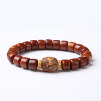 Bracelet de force en agate rouge et corne de mouton en os de yak tibétain de KarmaRipple