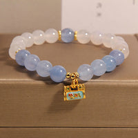 Bracelet de protection authentique en agate ivoire et aigue-marine de KarmaRipple