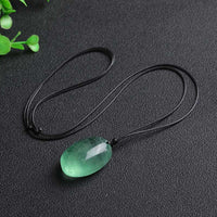 Collier pendentif en fluorite verte de KarmaRipple