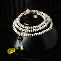 Bracelet de richesse tibétain en agate et ambre Bodhi Seed de KarmaRipple