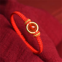 Bracelet en corde calme avec boucle de paix et perles d'agate rouge de KarmaRipple