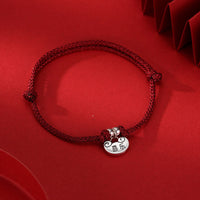 Bracelet en corde tissée fait main en argent sterling 925 de KarmaRipple, symbole de paix et de joie, de sécurité, de bien-être et de force.