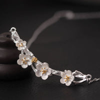 Collier avec pendentif en argent sterling 925 et protection de la pomme de prunier de KarmaRipple