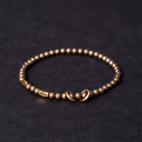 Bracelet en bronze et laiton avec perles de KarmaRipple's Wealth Self Care