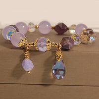 Bracelet de méditation en forme de goutte d'améthyste et d'ivoire de KarmaRipple