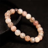 Bracelet d'équilibrage en pierre de lune pêche de KarmaRipple