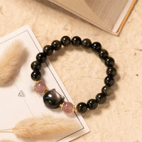 Bracelet de force en obsidienne noire et quartz fraise de KarmaRipple, perles en obsidienne argentée brillante, tête de chat