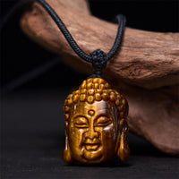 Collier avec pendentif en forme de tête de Bouddha en œil de tigre de KarmaRipple