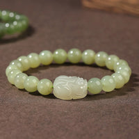 Bracelet porte-bonheur authentique en jade Hetian PiXiu sculpté de KarmaRipple