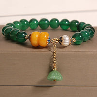Bracelet de soutien en agate verte, ambre et perle de lotus de KarmaRipple