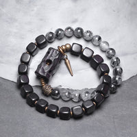 Bracelet d'équilibre double tour en bois d'ébène, quartz rutile noir, bronze et laiton de KarmaRipple