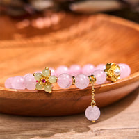 Bracelet de chaleur en citrine rose de KarmaRipple
