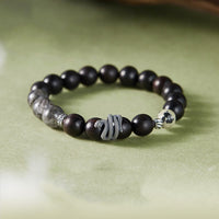 Bracelet d'équilibre en argent sterling 925 et quartz rutile noir en bois d'ébène de KarmaRipple, motif Année du Serpent