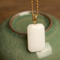 Collier pendentif prospérité en argent et jade Hetian de KarmaRipple