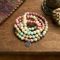 Bracelet Lotus Compassion en perles de rhodonite et d'amazonite de 108 Mala de KarmaRipple
