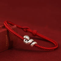 Bracelet tissé en argent sterling 999, motif pièce de bronze, fait main, année du serpent, de KarmaRipple