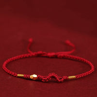 Bracelet tressé en mini-perles d'or 999 de KarmaRipple, fait main, avec protection de la fortune et motif Année du Serpent