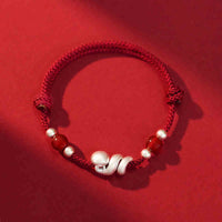 Bracelet artisanal en argent sterling 999 et agate rouge « Année du serpent » de KarmaRipple