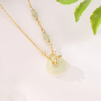 Collier avec pendentif en argent sterling 925 et zircone cubique en jade Hetian de KarmaRipple, symbole de la paix et de l'abondance