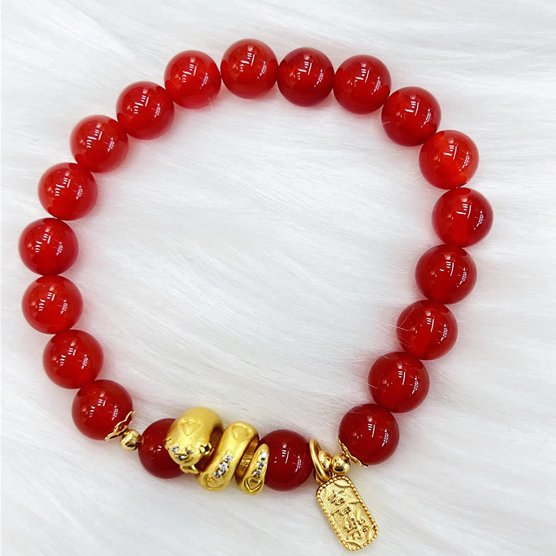 KarmaRipple's Red Agate Gold Plated Bronze Peace And Joy Safe Plate Year of the Snake Confidence Bracelet p1