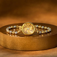 Bracelet tissé Feng Sheng Shui Qi en laiton bronze avec perles de moulin à vent rotatives de KarmaRipple