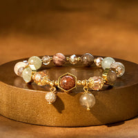Bracelet de protection authentique en quartz rutile et améthyste coloré de KarmaRipple