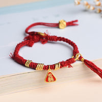 Bracelet de protection à pompon en forme de fleur, déesse de la richesse, en fil tibétain Zakiram de KarmaRipple