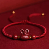 Bracelet en corde rouge fait main en cinabre avec motif du zodiaque chinois et lapin porte-bonheur de KarmaRipple