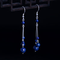 Boucles d'oreilles pendantes Serenity en argent sterling 925 et perles de lazurite de KarmaRipple
