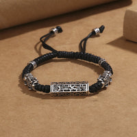 Bracelet tissé tibétain en bronze avec cordon noir, protection Om Mani Padme Hum Pixiu de KarmaRipple