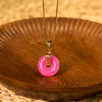 Collier avec pendentif en jade violet et boucle de paix de KarmaRipple