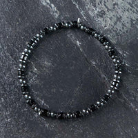 Bracelet puissant en perles d'hématite authentiques de KarmaRipple