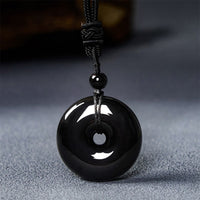 Collier avec pendentif en corde de force et boucle de paix en obsidienne noire authentique de KarmaRipple