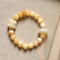 Bracelet Confiance en Fruits Ivoire et Agate Grise Ambrée de KarmaRipple