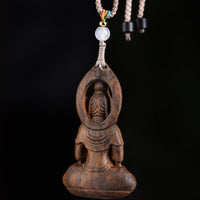 Collier pendentif en bois d'agar Qinan sculpté Avalokitesvara de KarmaRipple