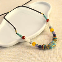 Collier pendentif en perles turquoise tibétaines faites à la main de KarmaRipple