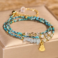 Bracelet triple tour en perles turquoise de KarmaRipple