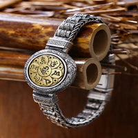 Bracelet en métal rotatif Om Mani Padme Hum avec boucle en bronze tibétain de KarmaRipple